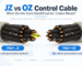 JZ vs OZ control cable comparison showing YSLY-JZ with a green-yellow protective conductor and YSLY-OZ without one, both using black numbered cores for industrial control applications.